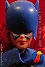 Fully articulated Mego 8-inch Batgirl action figure with authentic fabric uniform.
