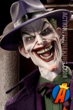 Sideshow Collectibles highly detailed sixth scale Joker action figure with authentic fabric uniform.