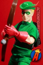 Fully articulated Silver Age Green Arrow action figure with authentic fabric outfit.