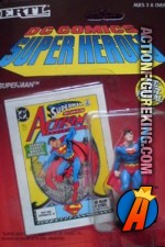 2-inch DC Comics Super-Heroes Die-Cast Metal Superman Raised Fist figure.