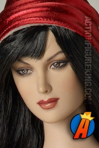 Fully articulated Tonner 16-inch dressed Elektra figure.