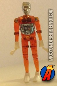 A Micronauts orange TIME TRAVELER action figure from MEGO