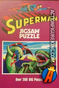 Superman fights a large green dinosaur-like creature in this 200-piece jigsaw-puzzle from 1973.