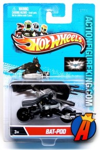 Batman figure riding Bat Pod vehicle from Hot Wheels circa 2014.