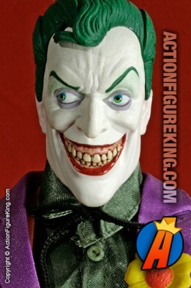 13 Inch DC Direct fully articulated Joker action figure with authentic fabric outfit.