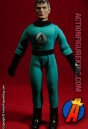 Fully articulated Mego 8-inch Mr. Fantastic action figure with removable fabric outfit.