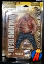 The Walking Dead Well Zombie figure in the larger packaging.
