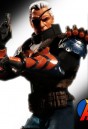 Mezco 6-Inch Scale DC Comics DEATHSTROKE Figure with highly detailed cloth uniform.