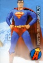 13-Inch Classic Superman action figure from  with authentic fabric outfit.