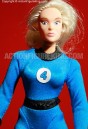 Famous Cover Series 8 inch Invisible Woman action figure is torn from the pages of Marvel&#039;s Fantastic Four comic book.