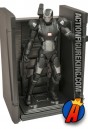 Fully articulated War Machine figure with display stand.