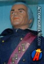 Fully articulated Mego sixth-scale Dr. Huer action figure with authentic fabric outfit.