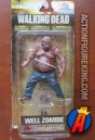 A packaged sample of this Walking Dead Well Zombie figure.