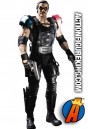 From The Watchmen comes this 13-inch Comedian action figure with authentic fabric outfit by DC Direct.