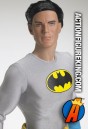 An unmasked Tonner Batman figure reveals a handsome Bruce Wayne.