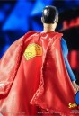 Notice the inclusion of the yellow &quot;S&quot; emblem on the back of Superman&#039;s cape.