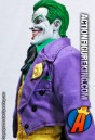 Fully articulated 12-inch custom Joker action figure with removable fabric outfit.