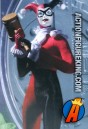 The Joker&#039;s cohort, Harley Quinn, is presented here as a sixth scale action figure with cloth uniform from DC Direct.