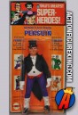 A Kresge packaged Mego 8-inch Penguin figure.