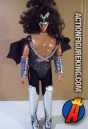 KISS and Mego present this 12-inch Gene Simmons action figure with removable fabric uniform.