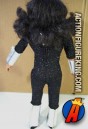 Rear view of this Mego 12-Inch KISS Ace Frehley action figure with removable cloth uniform and rooted hair.