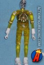 A yellow version of this TIME TRAVELER action figure from the MICRONAUTS series by MEGO.