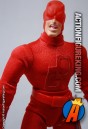 Mego style Famous Cover Series 8 inch Daredevil figure with removable fabric outfit.