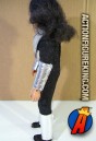 Side view of this fully articulated Mego KISS Ace Frehley action figure with authentic fabric outfit.