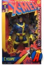 Colorful 4-color graphics on the inside and outside of the packaging of this 10-inch Deluxe Cyclops action figure.