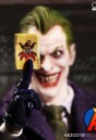 Mezco 1:12 Scale JOKER Action Figure with highly detailed cloth outfit.