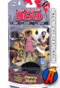 A packaged sample of this Walking Dead Comic Series 2 Governor&#039;s Daughter, Penny figure.