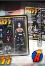 A packaged sample of this fully articulated 8-inch KISS The Spaceman action figure with removable cloth uniform.