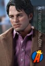 The Hot Toys 12-inch Bruce Banner comes dressed in a brown suit and purple shirt.