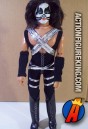 Fully articualted Mego 12-inch Peter Criss action figure with authentic fabric uniform.