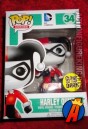 A packaged sample of this Funko Pop Heroes Glow-in-the-Dark Harley Quinn figure.